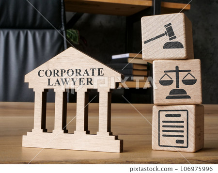 A Sign corporate lawyer on the table in the office. 106975996