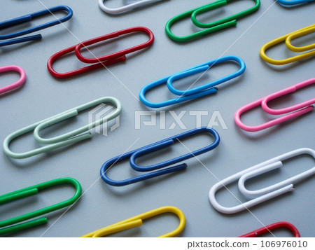 Multicolored paper clips as a symbol of diversity. 106976010