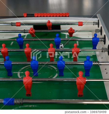 Board game football, an active and developing game for motor skills, attentiveness and dexterity for children 106978499