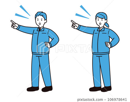 A man and a woman in work clothes pointing and checking 106978641