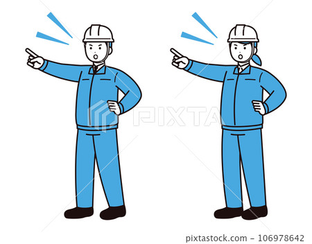 穿著工作服的男女指點和檢查，戴著頭盔 106978642