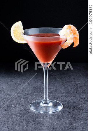 Shrimp cocktail on black background Shrimp cocktail on black background 106979582