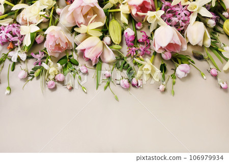 Blossoming white and light pink tulips and spring flowers festive background, bright springtime bouquet floral card Blossoming white and light pink tulips and spring flowers festive background, bright springtime bouquet floral card 106979934
