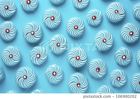 Creative minimal Christmas art. Pattern made with Christmas candies on bright blue background. Flat lay. Copy space. Minimal composition 106980202