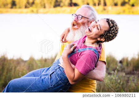 Carefree Moments: Laughter Under Open Skies Carefree Moments: Laughter Under Open Skies 106980211
