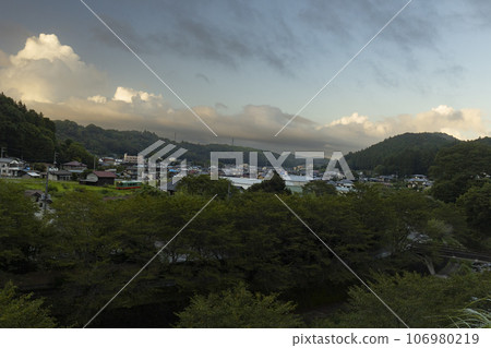 Cumulonimbus clouds and Moka Railway at dusk Cumulonimbus clouds and Moka Railway at dusk 106980219