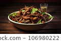 Fried insects in a bowl on a wooden background, Selective focus. Fried crickets, Asian food, Natural protein 106980222