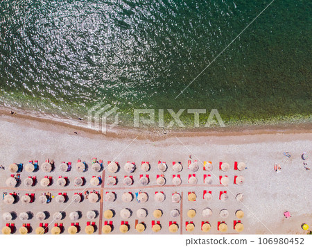 Aerial photographs. View from flying drone. Birds-eye view of beach in Montenegro. Top view Aerial photographs. View from flying drone. Birds-eye view of beach in Montenegro. Top view 106980452