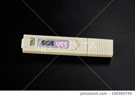 TDS meter Isolated On a black Background TDS meter Isolated On a black Background 106980749