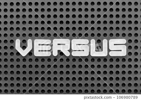 White alphabet letter in word versus on black pegboard background White alphabet letter in word versus on black pegboard background 106980789