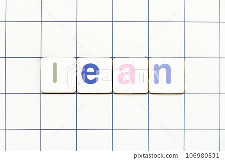 Colorful tile letter in word lean on white grid background 106980831