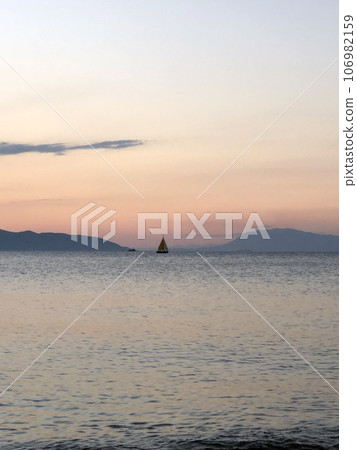Sheep and Golden Beautiful sunset at the seaside, Greece Sheep and Golden Beautiful sunset at the seaside, Greece 106982159