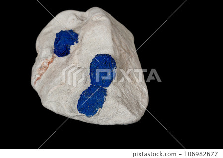 Macro mineral stone Azurite in siltstone against black background Macro mineral stone Azurite in siltstone against black background 106982677