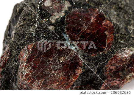 macro mineral stone Garnet, on a white background macro mineral stone Garnet, on a white background 106982685