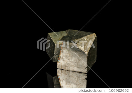 Macro mineral stone Pyrite on a black background Macro mineral stone Pyrite on a black background 106982692