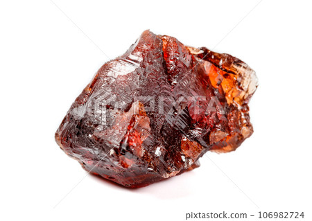 Macro mineral stone Garnet Spessartine on a white background Macro mineral stone Garnet Spessartine on a white background 106982724