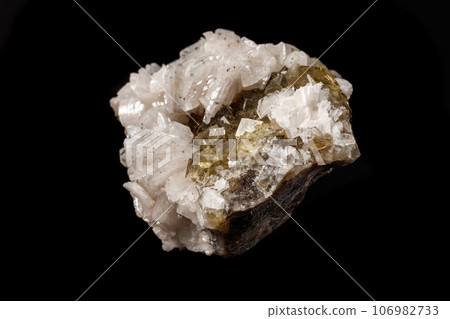Macro mineral stone Baryta On Fluorite On a black background Macro mineral stone Baryta On Fluorite On a black background 106982733
