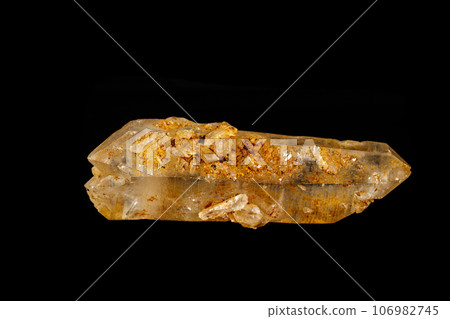 Macro mineral quartz stone on a black background Macro mineral quartz stone on a black background 106982745