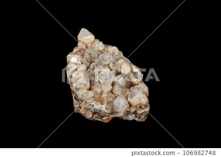 Macro mineral quartz stone with fluorite on granite on a black background 106982748
