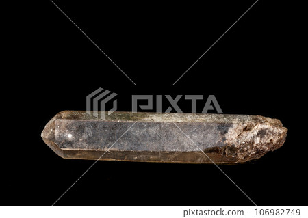 Macro mineral stone smoky quartz, rauchtopaz on a black background 106982749