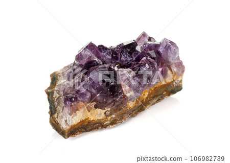 Amethyst Crystal Druse macro mineral on white background Amethyst Crystal Druse macro mineral on white background 106982789