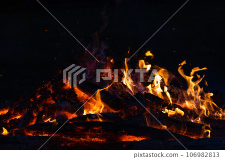 Beautiful fire flames on a campfire 106982813