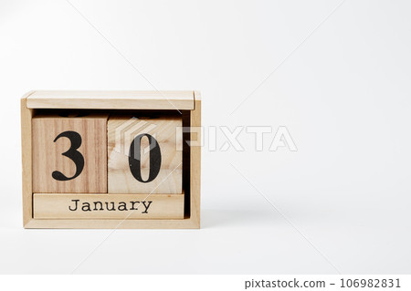 Wooden calendar January 30 on a white background Wooden calendar January 30 on a white background 106982831