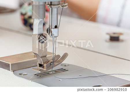 Sewing machine needle with thread and fabric Sewing machine needle with thread and fabric 106982910