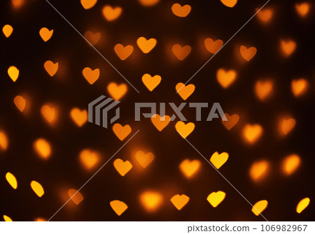 beautiful hearts made of lights on a blurred background 106982967