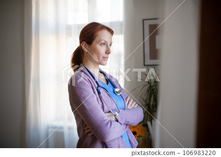 Portrait of young nurse, concept of healthcare in seniors home. Portrait of young nurse, concept of healthcare in seniors home. 106983220