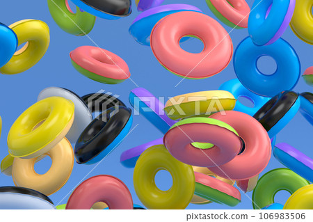 Many of flying inflatable ring for swimming pool isolated on blue background Many of flying inflatable ring for swimming pool isolated on blue background 106983506