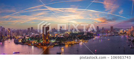 Wonderful purple sunset panorama of the Nile and Gezira island in Cairo, Egypt Wonderful purple sunset panorama of the Nile and Gezira island in Cairo, Egypt 106983743