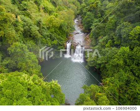 Asian jungle and Khlong Chao waterfall on Koh Kood island. Thailand Asian jungle and Khlong Chao waterfall on Koh Kood island. Thailand 106984000