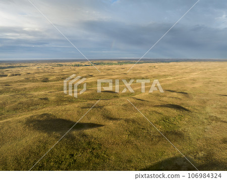 landscape of Nebraska Sandhills at Nebraska National Forest  with distant Dismal River, late summer aerial view 106984324