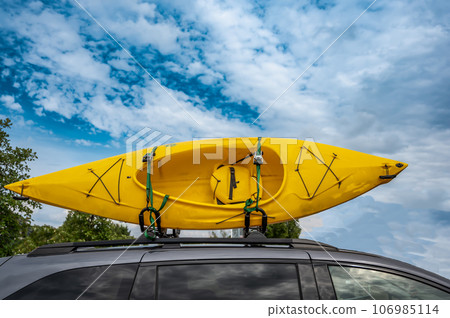 Roof mounted kayak on top of a van for transportation  106985114