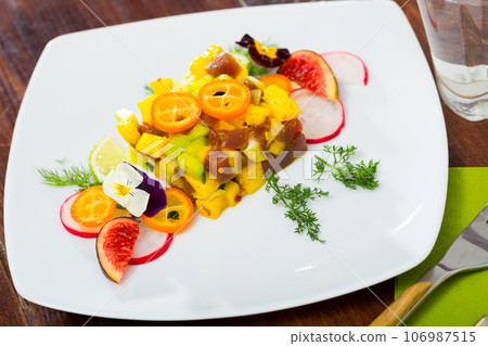 Raw tuna tartare with mango and avocado Raw tuna tartare with mango and avocado 106987515