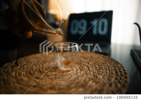 Drip coffee on the table in the house Drip coffee on the table in the house 106988138