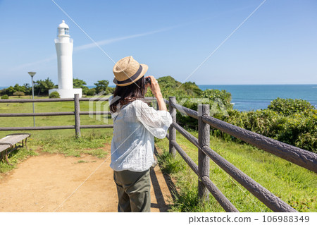 Hitachi Lighthouse and Koboji Park: Woman looking at the sea through binoculars 106988349