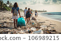 Group of volunteers collecting plastic waste on the beach. Recycling concept 106989215