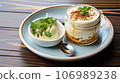 Creamy yogurt with caramel sauce and mint on wooden background 106989238
