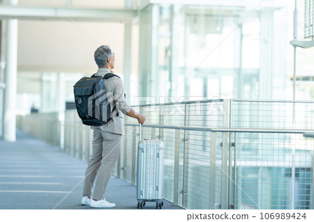 Senior man traveling Senior man traveling 106989424