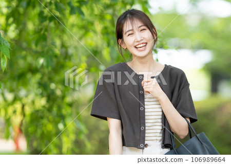 A young woman with a smile 106989664