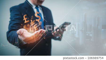 Stock market, Business growth, progress or success concept. Businessman or trader is showing a growing virtual hologram stock, invest in trading. Stock market, Business growth, progress or success concept. Businessman or trader is showing a growing virtual hologram stock, invest in trading. 106989754