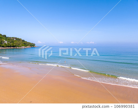 Summer sea nature background,Aerial view of Waves crashing on sandy shore,Sea surface ocean waves background 106990381