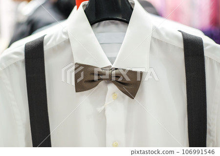 White shirt with dark bowtie White shirt with dark bowtie 106991546