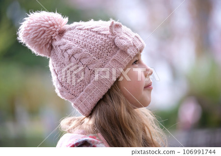 Portrait of cute little child girl in pink hat Portrait of cute little child girl in pink hat 106991744