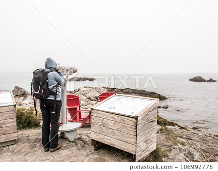Exploring the beach in the mist morning at Kejimkujik National Park Seaside, Nova Scotia, Canada Exploring the beach in the mist morning at Kejimkujik National Park Seaside, Nova Scotia, Canada 106992778