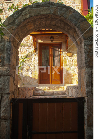 Wooden natural door of nostalgic house in Datca or Old Datca, Mugla Turkey, june 29 2023 Wooden natural door of nostalgic house in Datca or Old Datca, Mugla Turkey, june 29 2023 106995018