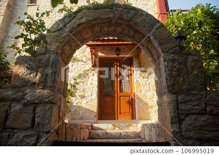 Wooden natural door of nostalgic house in Datca or Old Datca, Mugla Turkey, june 29 2023 106995019