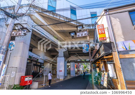 Kawasaki cityscape in Japan September. View of Futako-Shinchi Station under the elevated tracks Kawasaki cityscape in Japan September. View of Futako-Shinchi Station under the elevated tracks 106996450